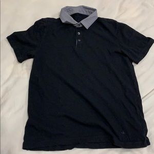 Black polo shirt